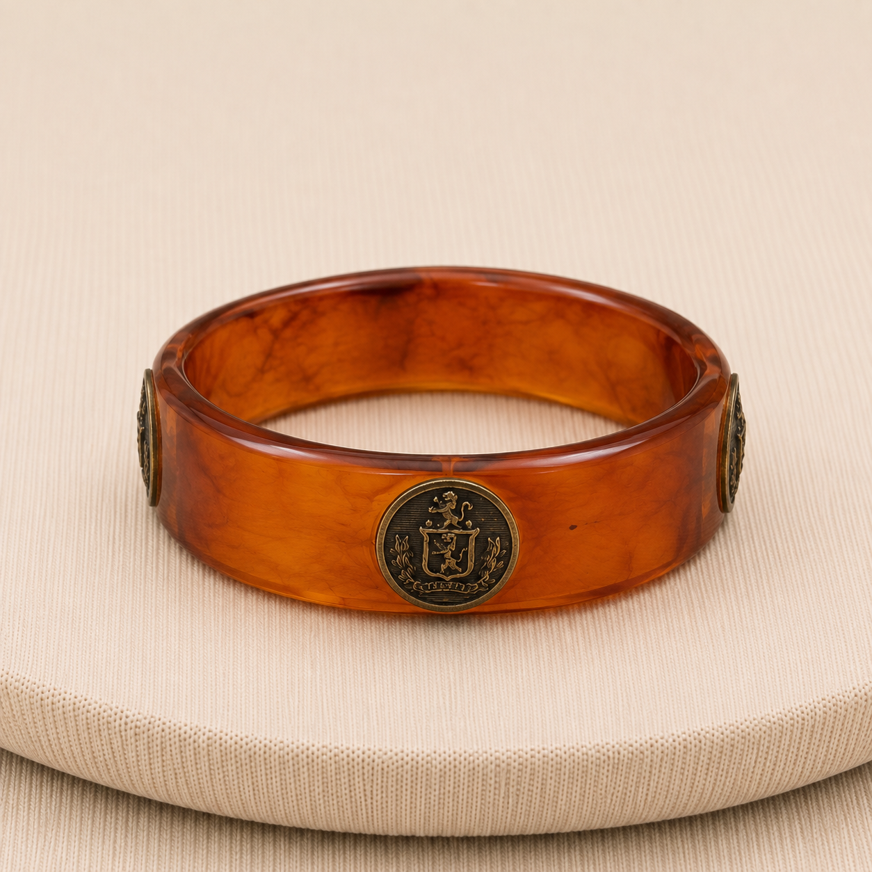 Vintage Amber Bakelite Crest Medallion Wide Bangle